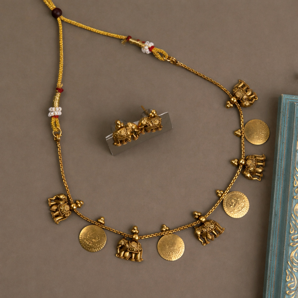 Elephant coin necklace