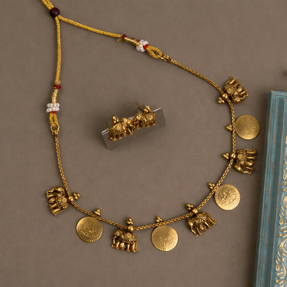 Elephant coin necklace