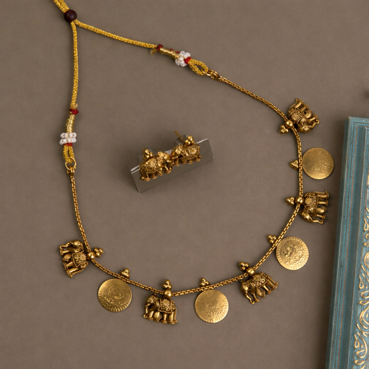 Elephant coin necklace